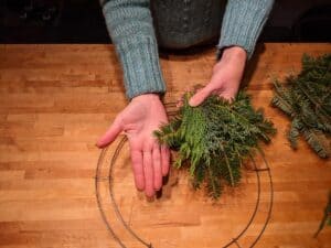 Demonstrating the correct size of greenery bundle